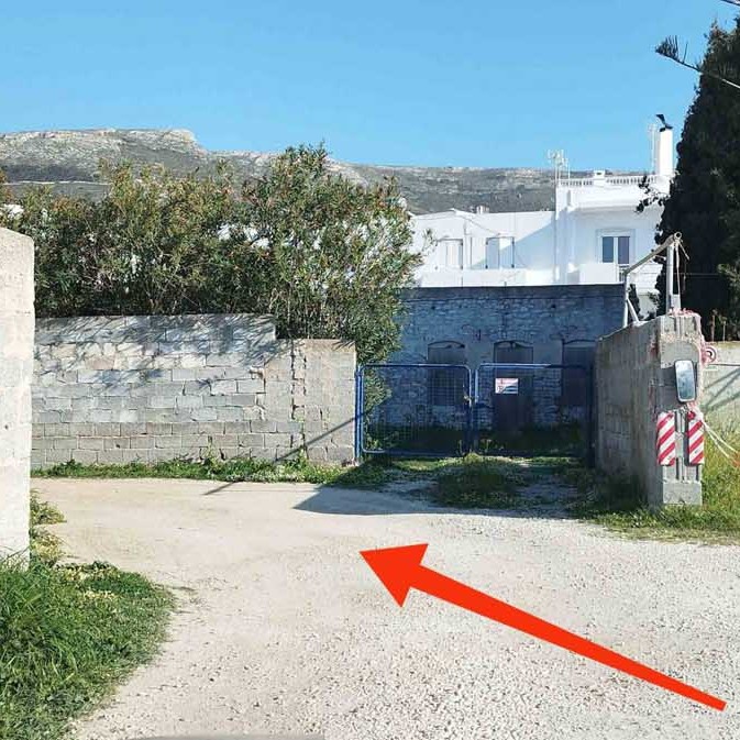 Turn inside the alley toward the Motorland pick-up point at Paros Port